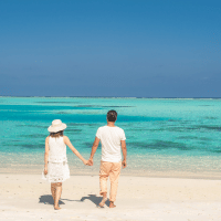 Couple walking on a beach